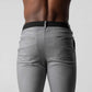 Pantalones deportivos ajustados elásticos para hombre