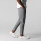 Pantalones deportivos ajustados elásticos para hombre